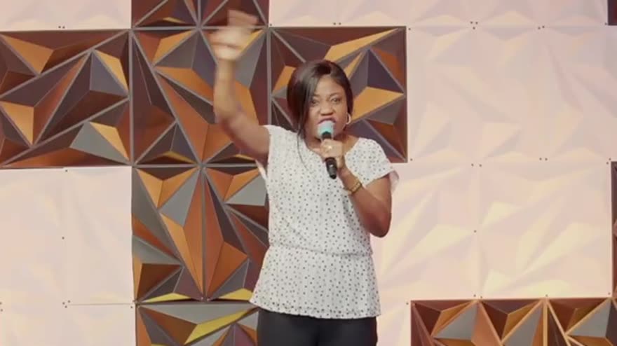 Pastor Stella Boadum leading worship